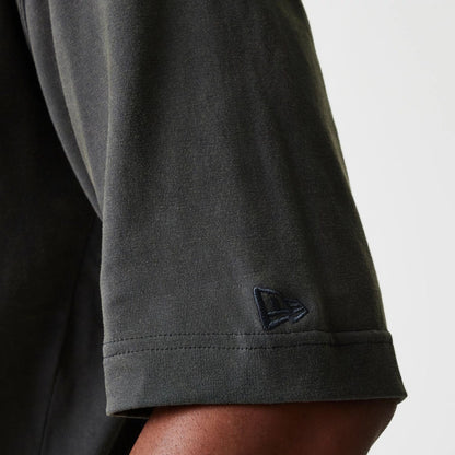 The Male model is wearing Milwaukee Bucks NBA Washed Graphic Grey T-Shirt 7