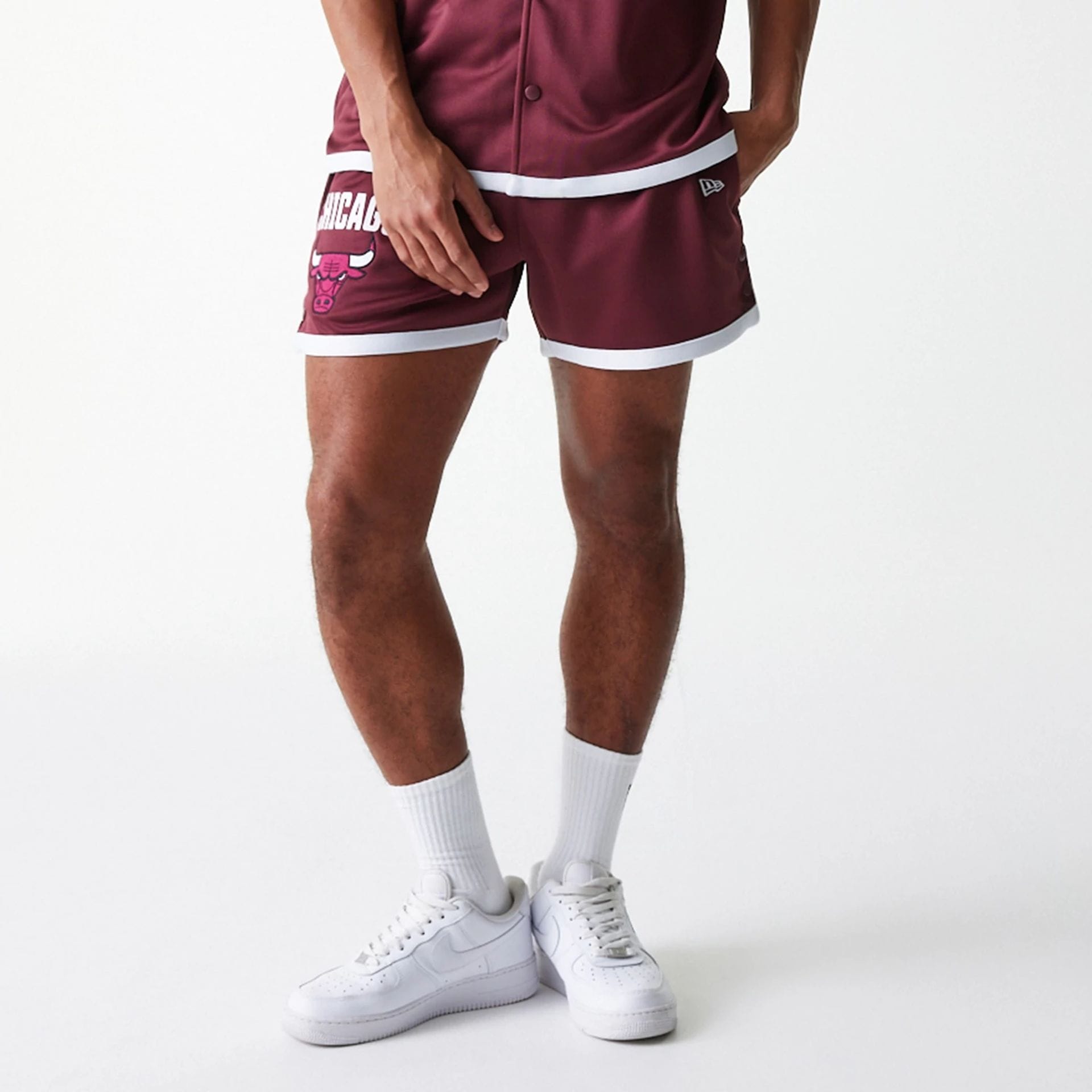 The Male model is wearing Chicago Bulls NBA Snap Button Dark Red Shorts 7