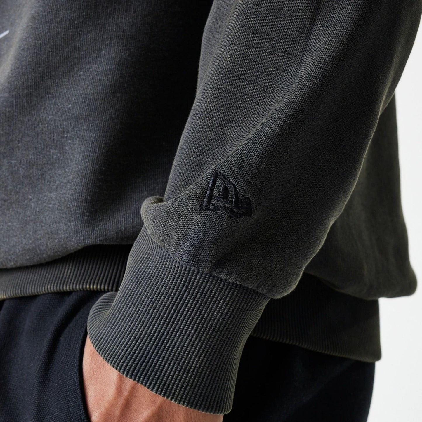 The Male model is wearing Las Vegas Raiders NFL Washed Super Bowl Grey Oversized Crew Neck Sweater 7