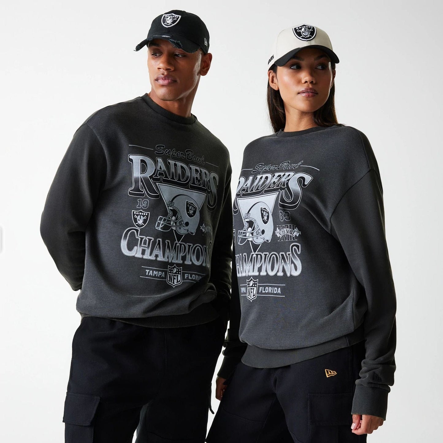The Male model is wearing Las Vegas Raiders NFL Washed Super Bowl Grey Oversized Crew Neck Sweater 1