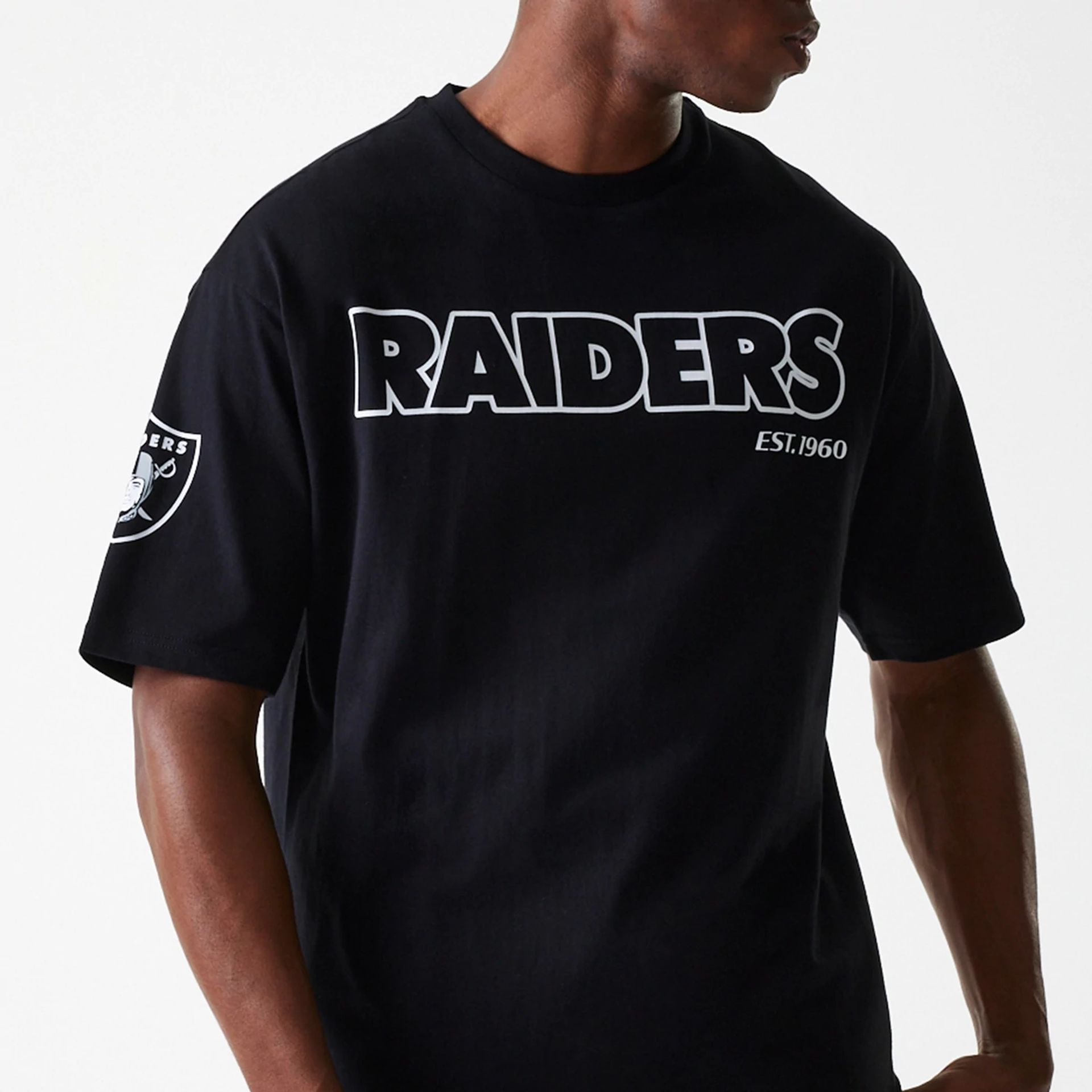 The Male model is wearing Las Vegas Raiders NFL Wordmark Black Oversized T-Shirt 6