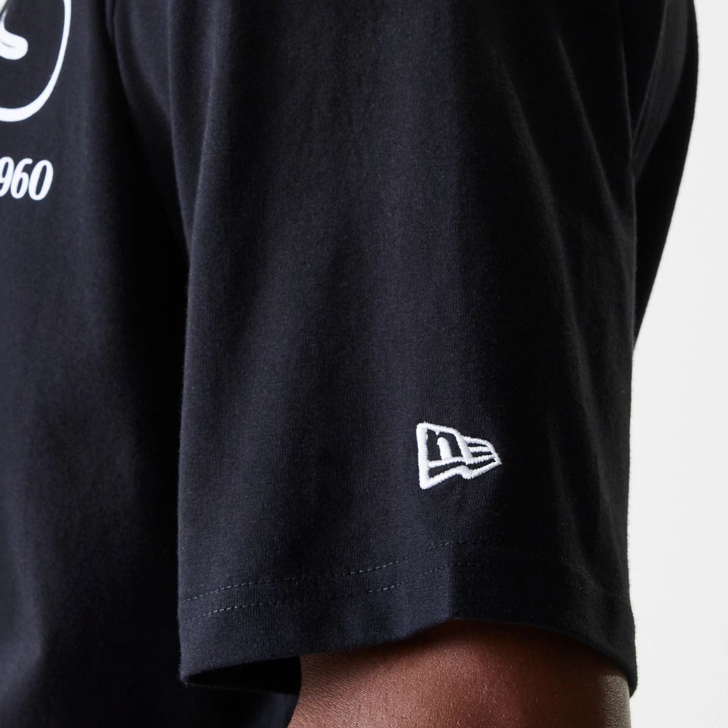 The Male model is wearing Las Vegas Raiders NFL Wordmark Black Oversized T-Shirt 4