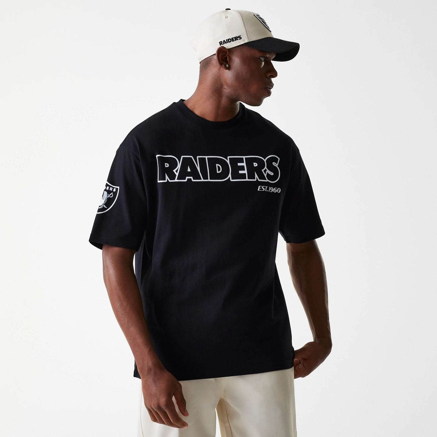 The Male model is wearing Las Vegas Raiders NFL Wordmark Black Oversized T-Shirt 1