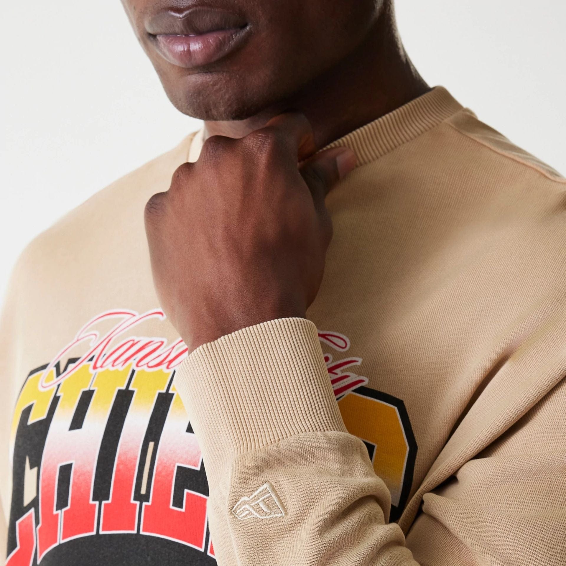 The Male model is wearing Kansas City Chiefs NFL Washed Super Bowl Beige Oversized Crew Neck Sweater 5
