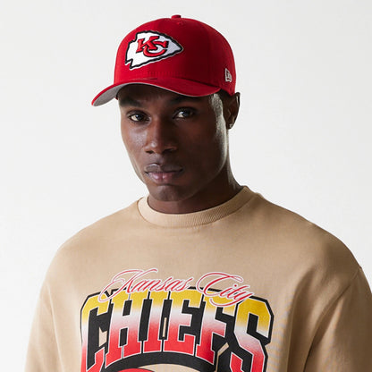 The Male model is wearing Kansas City Chiefs NFL Washed Super Bowl Beige Oversized Crew Neck Sweater 6