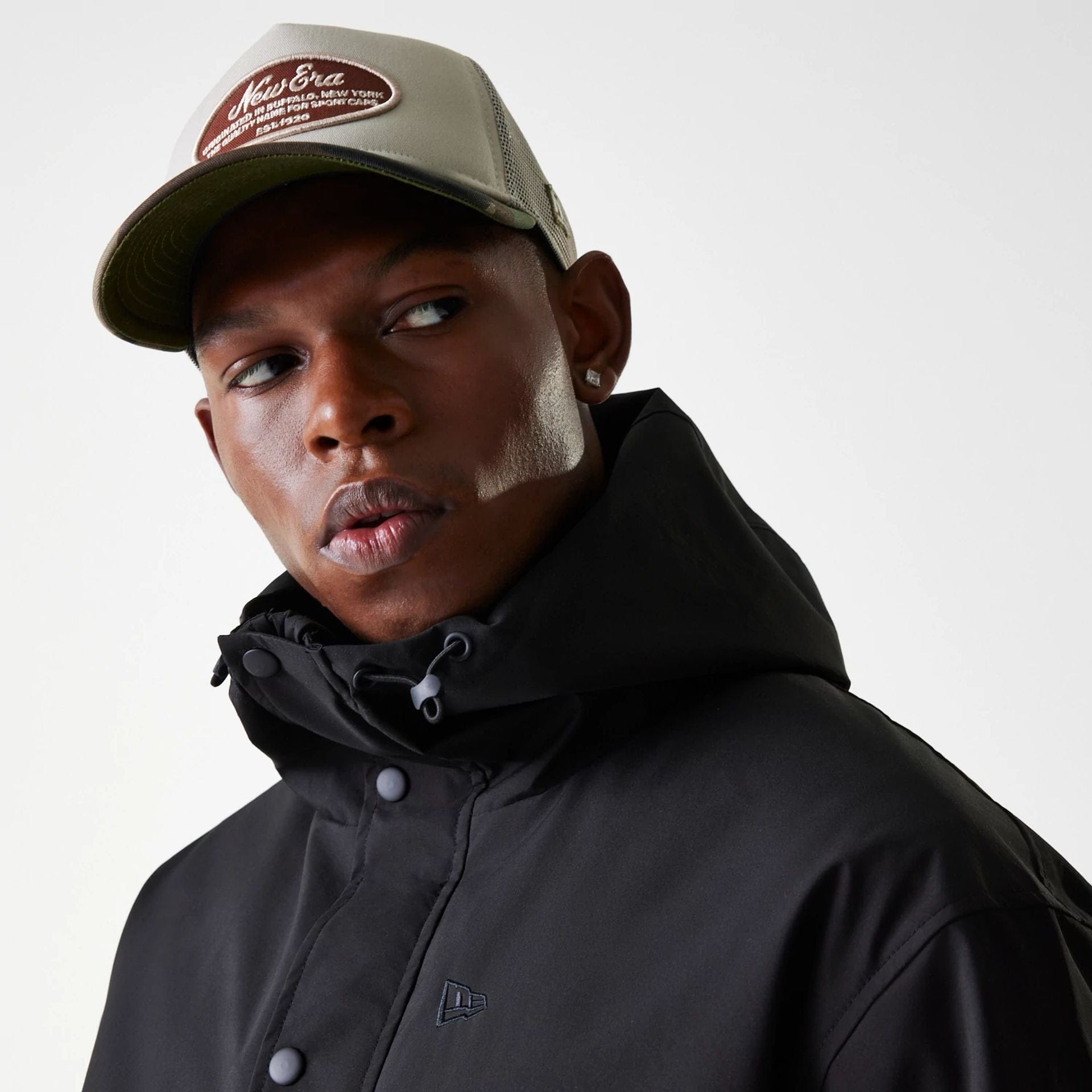 The Male model is wearing New Era Black Coach Jacket 6