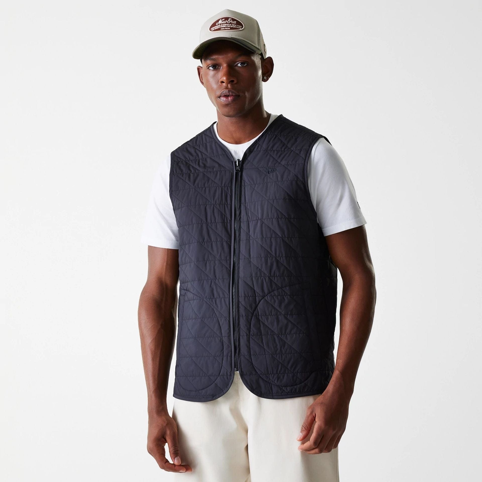 The Male model is wearing New Era Black Coach Jacket 4