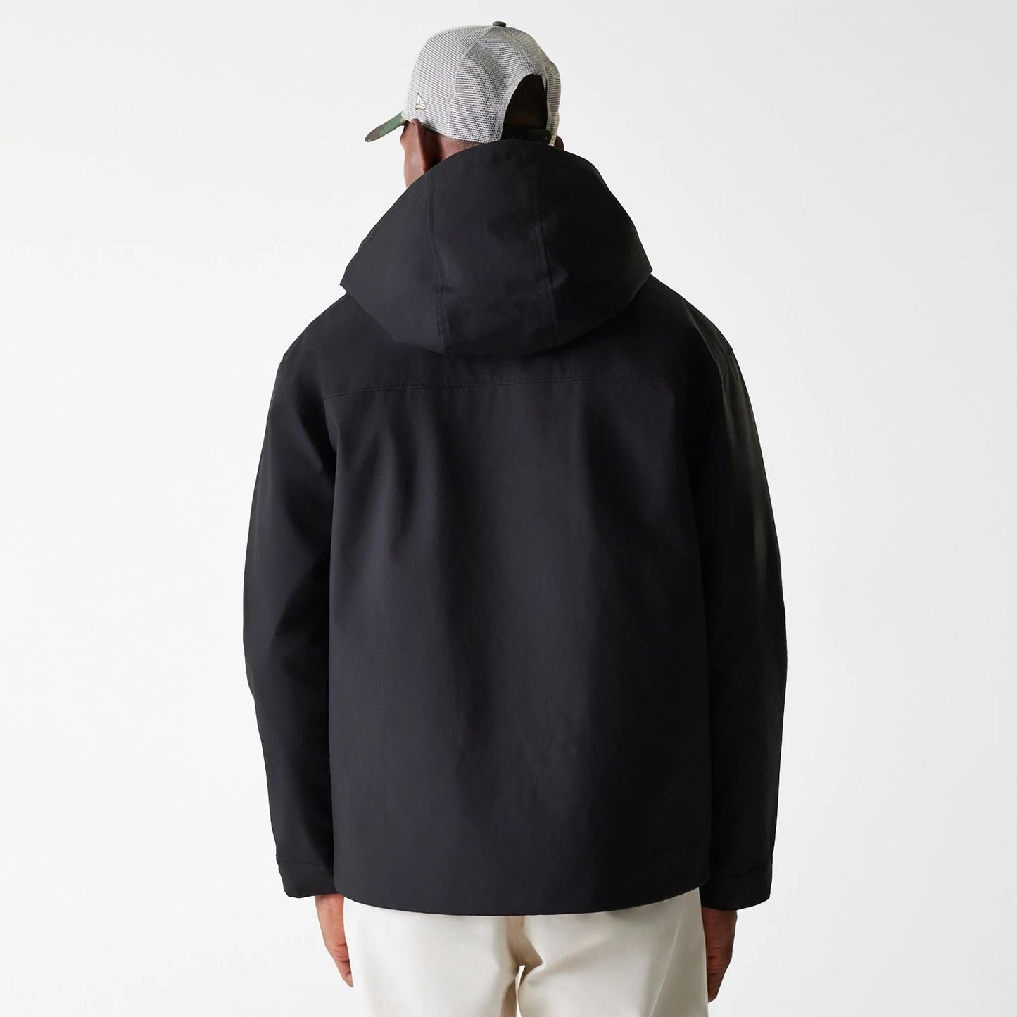 The Male model is wearing New Era Black Coach Jacket 2