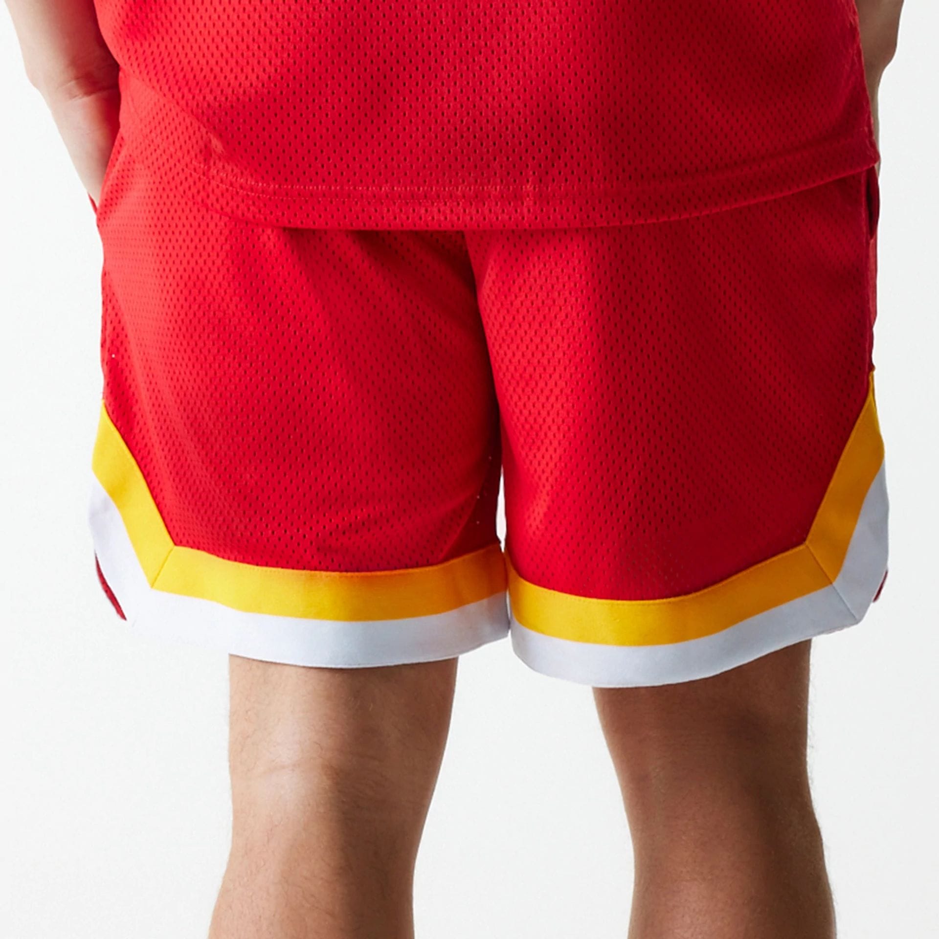 The Male model is wearing Kansas City Chiefs NFL Mesh Red Shorts 6