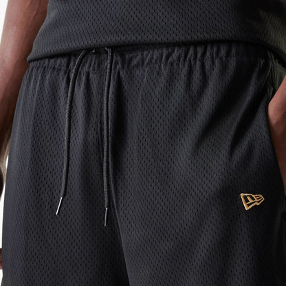 The Male model is wearing San Francisco 49ers NFL Mesh Black Shorts 5