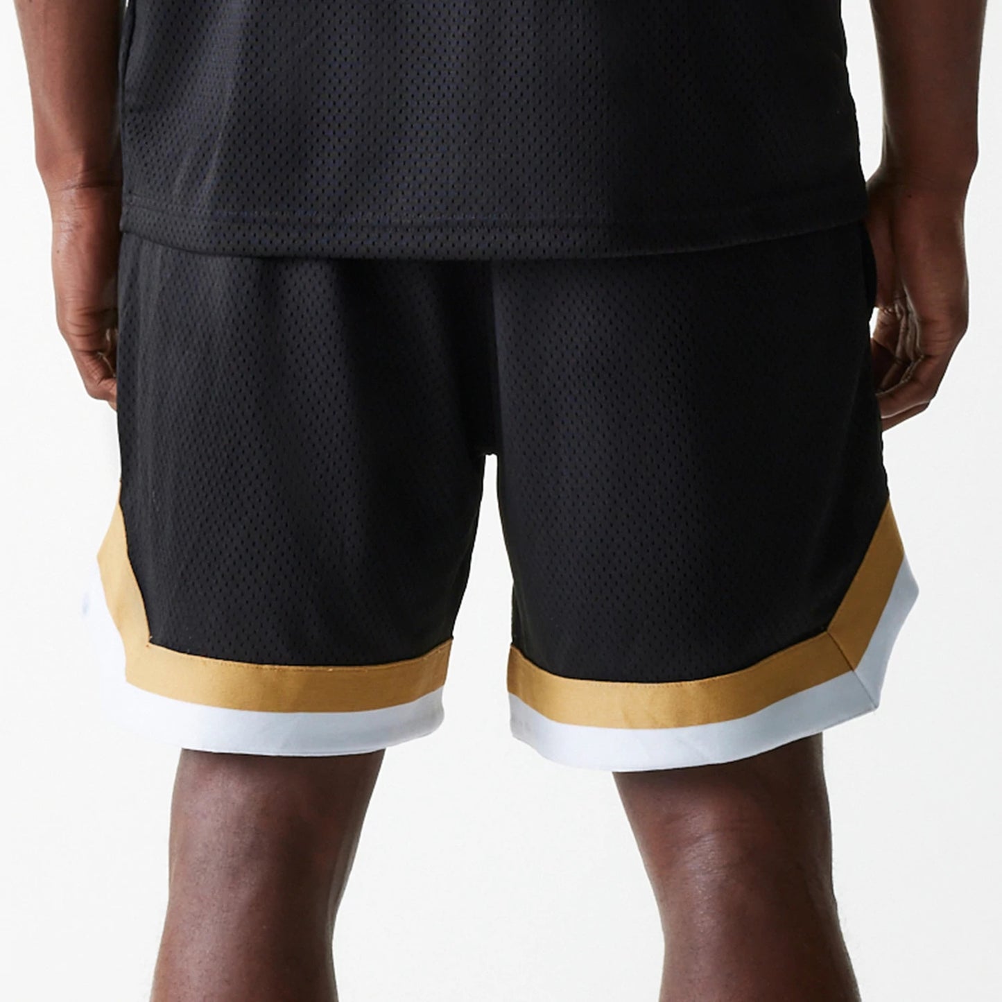 The Male model is wearing San Francisco 49ers NFL Mesh Black Shorts 6