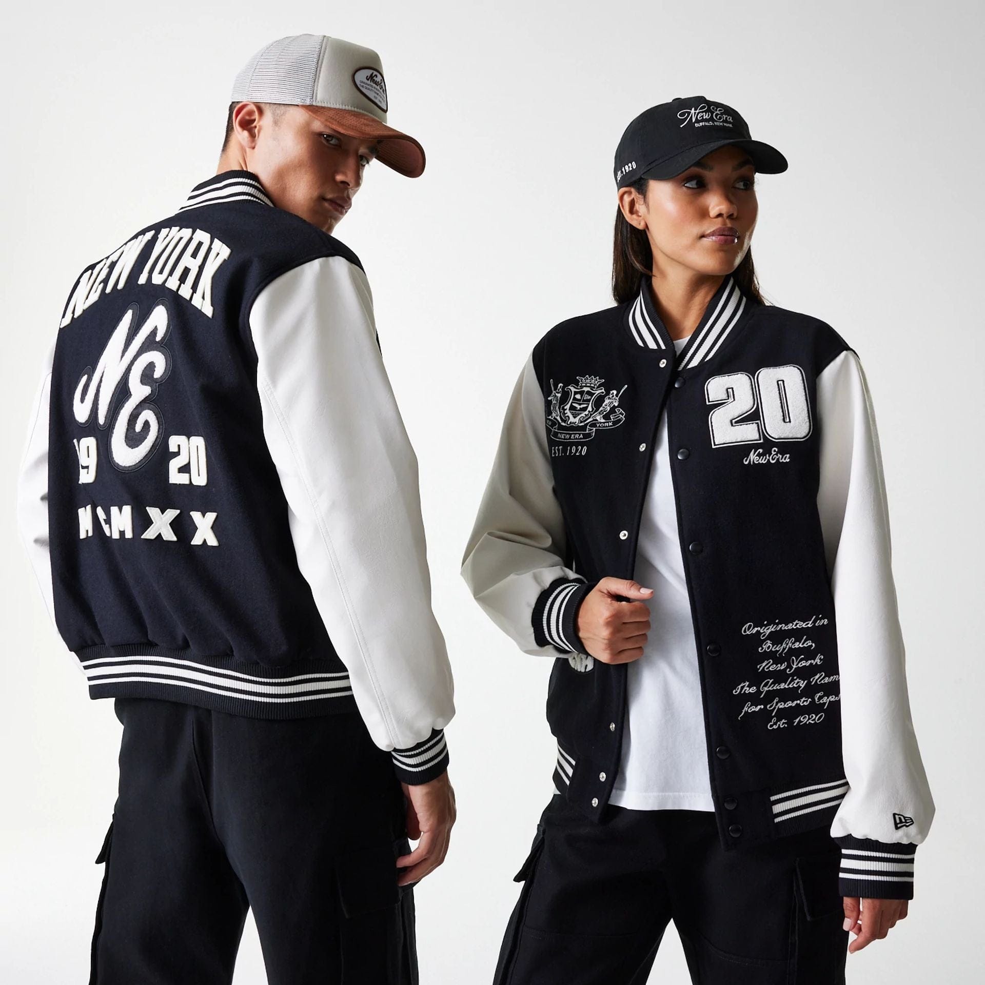 The Male model is wearing New Era Patch Black Varsity Jacket 1