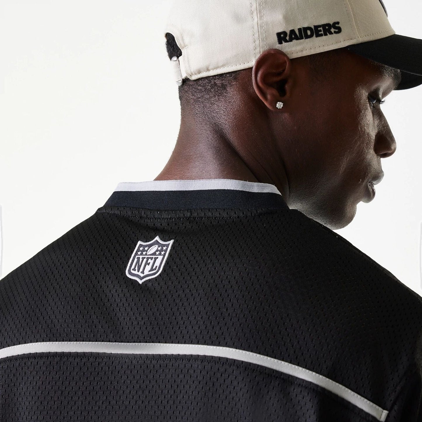 The Male model is wearing Las Vegas Raiders NFL Mesh Black Jersey 4