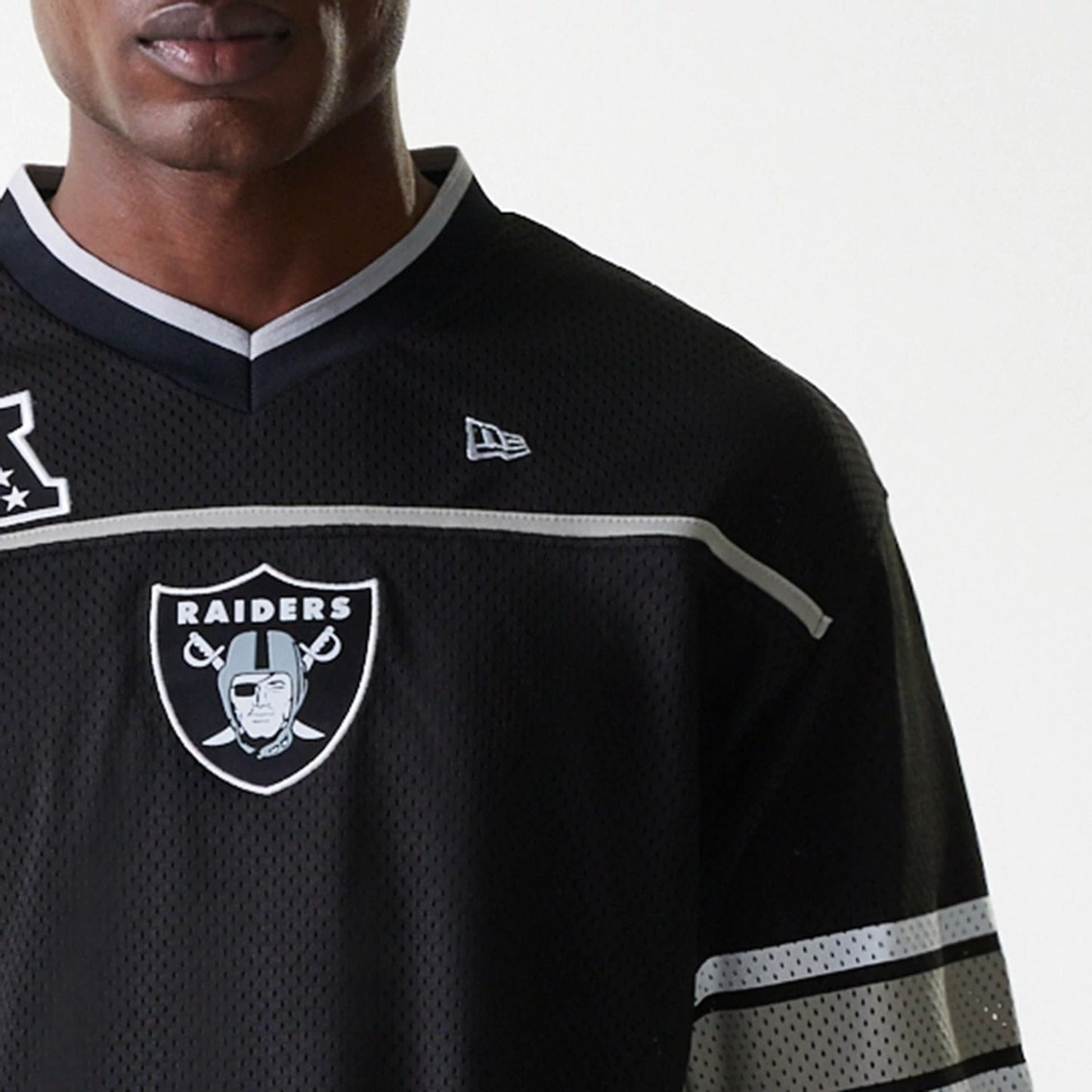 The Male model is wearing Las Vegas Raiders NFL Mesh Black Jersey 5