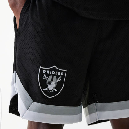 The Male model is wearing Las Vegas Raiders NFL Mesh Black Shorts 3