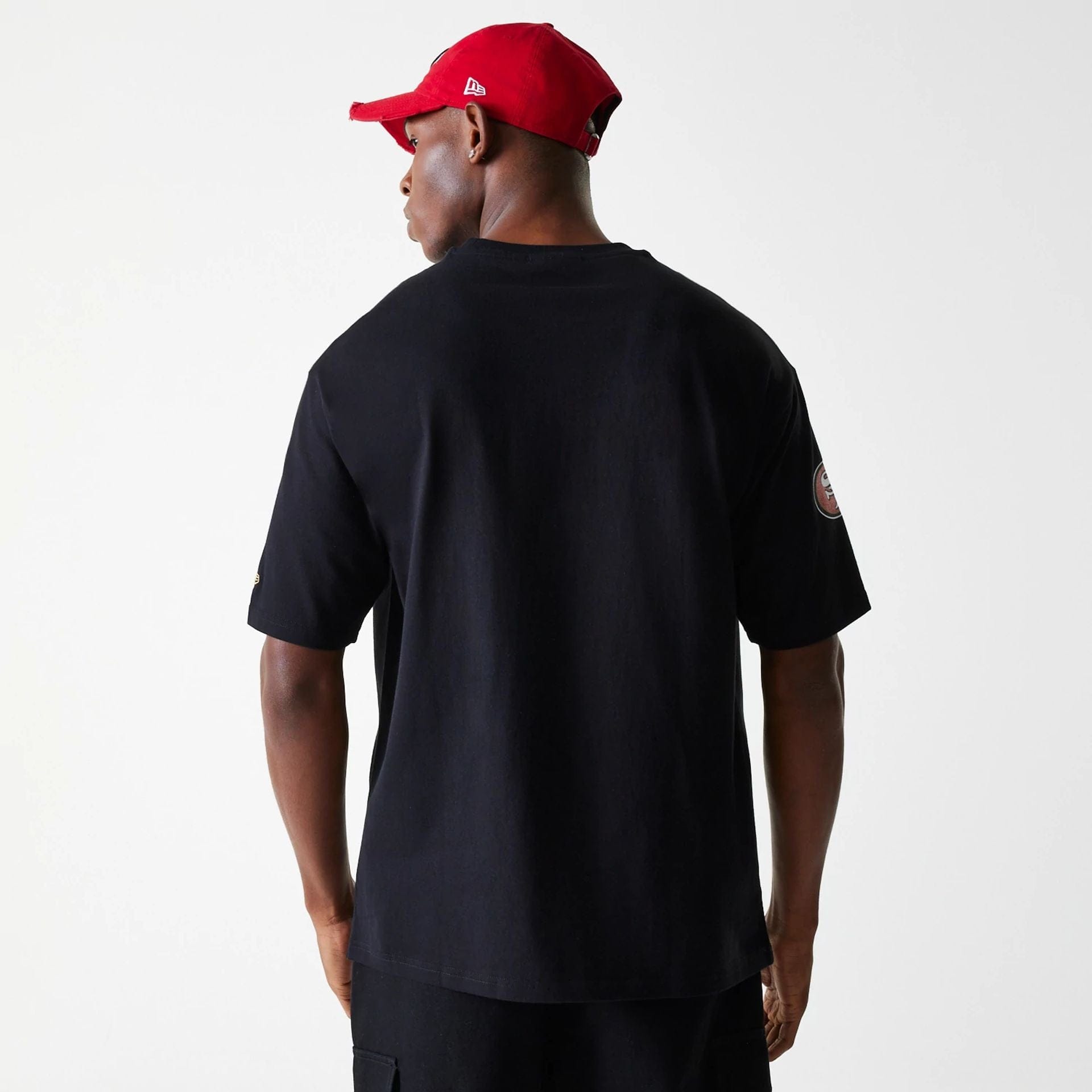 The Male model is wearing San Francisco 49ers NFL Wordmark Black Oversized T-Shirt 2