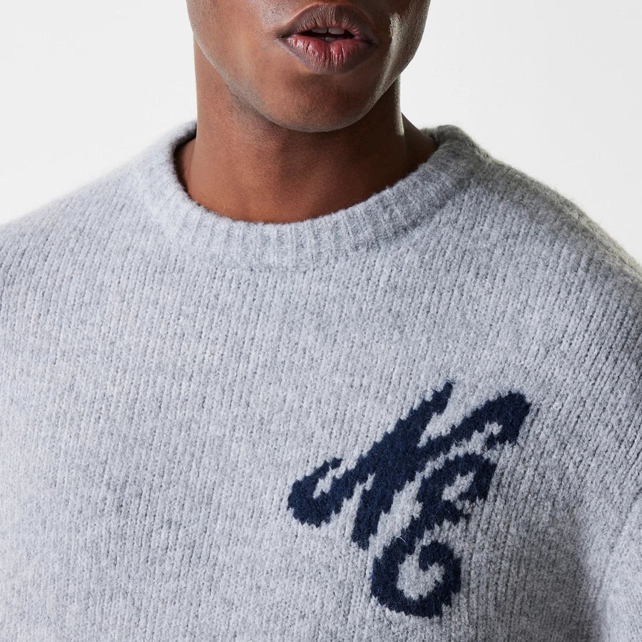 The Male model is wearing New Era Knit Grey Oversized Knit Sweater 5