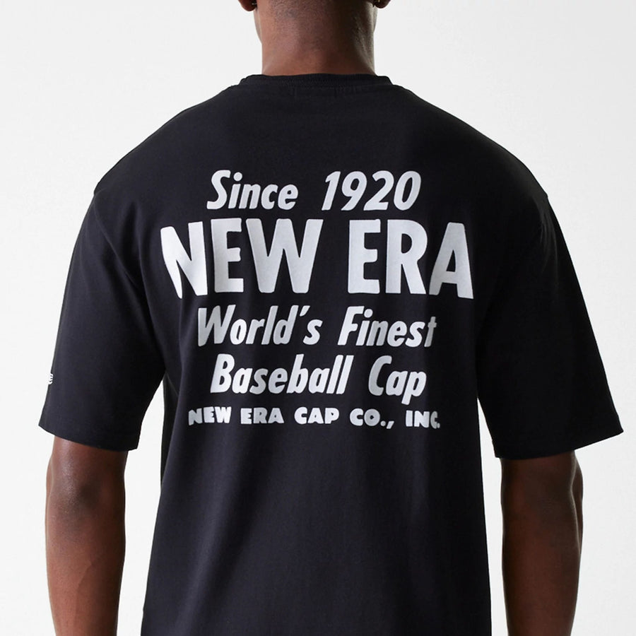 The Male model is wearing New Era Graphic Black Oversized T-Shirt 4