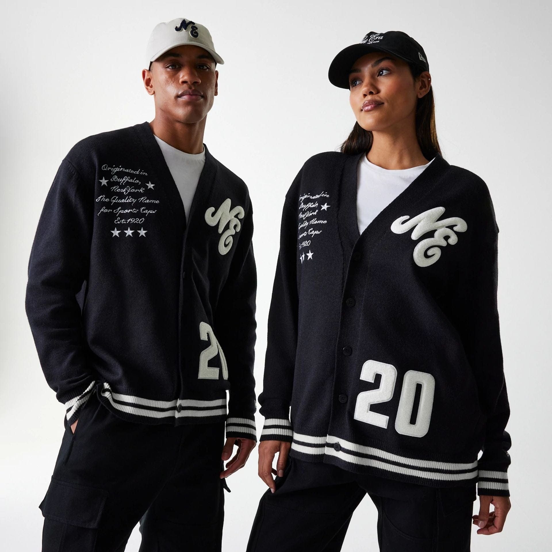 The Male model is wearing New Era Knit Black Cardigan 1