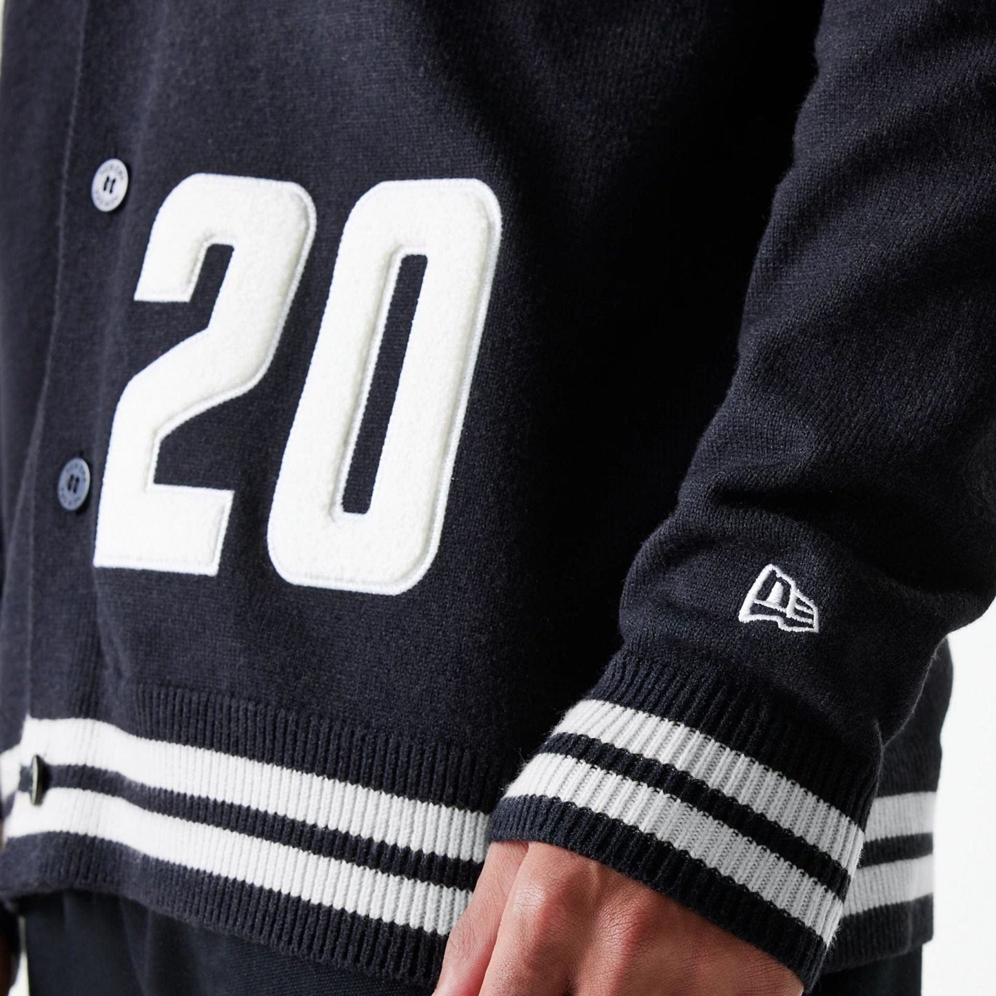 The Male model is wearing New Era Knit Black Cardigan 7