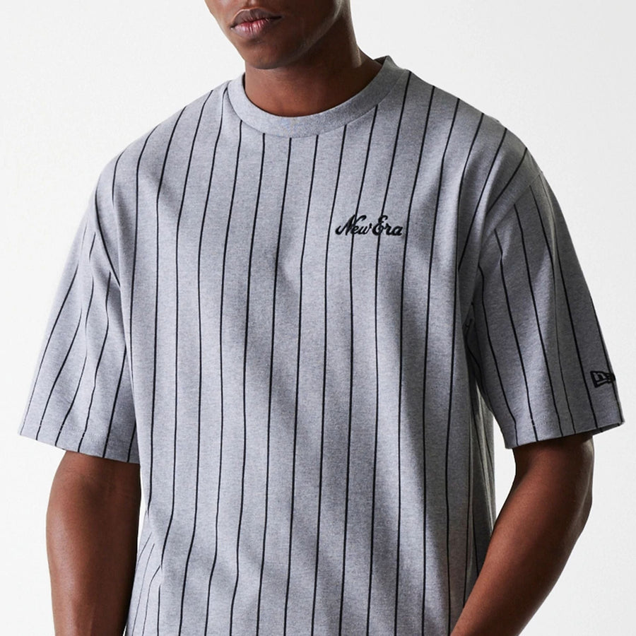 The Male model is wearing New Era Pinstripe Pastel Grey Oversized T-Shirt 3