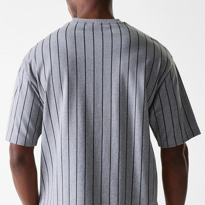 The Male model is wearing New Era Pinstripe Pastel Grey Oversized T-Shirt 6