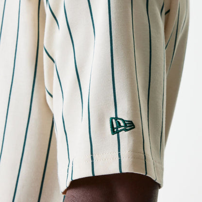 The Male model is wearing New Era Pinstripe Light Beige Oversized T-Shirt 7
