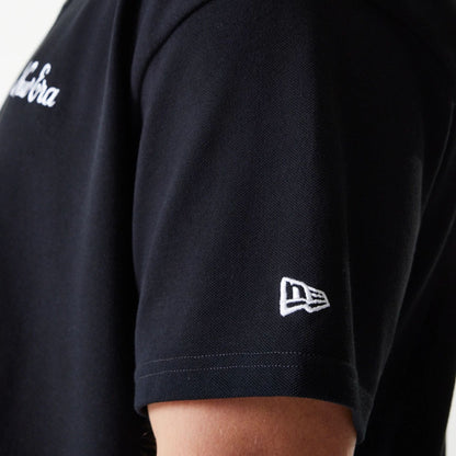 The Male model is wearing New Era Script Black Polo T-Shirt 5