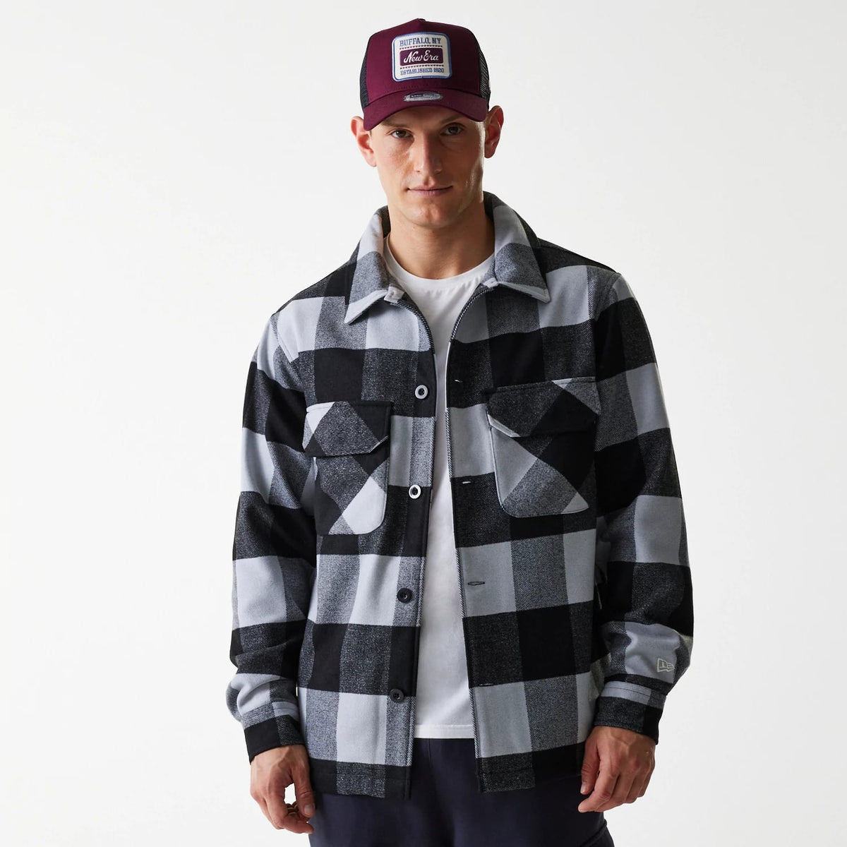 The Male model is wearing New Era Black Shacket 7