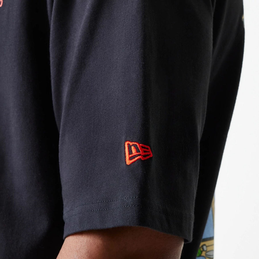 The Male model is wearing New Era Cafe Graphic Black Oversized T-Shirt 7