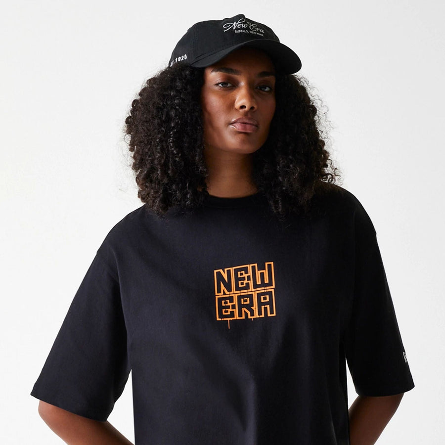 The Male model is wearing New Era Graffiti Graphic Black Oversized T-Shirt 6