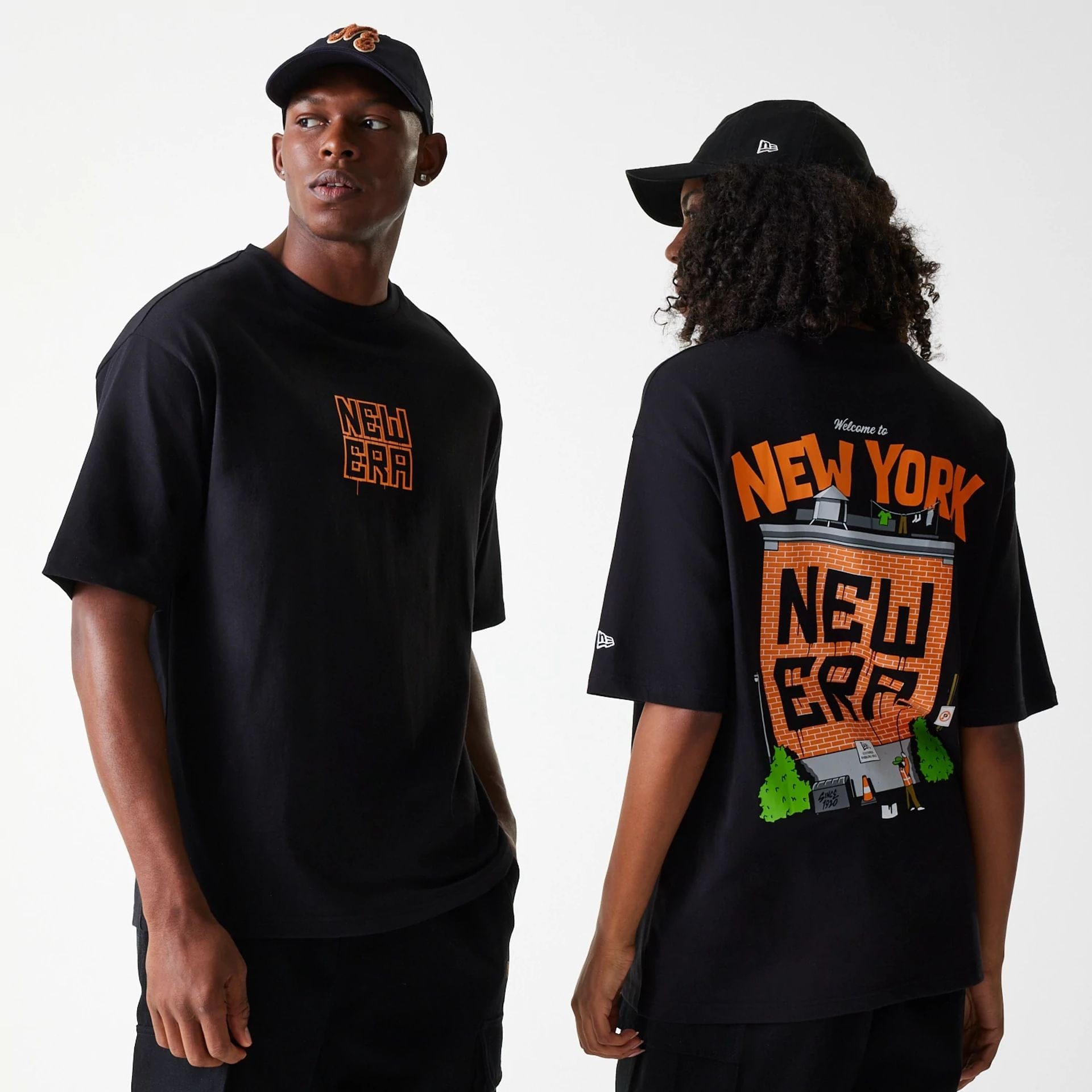 The Male model is wearing New Era Graffiti Graphic Black Oversized T-Shirt 1