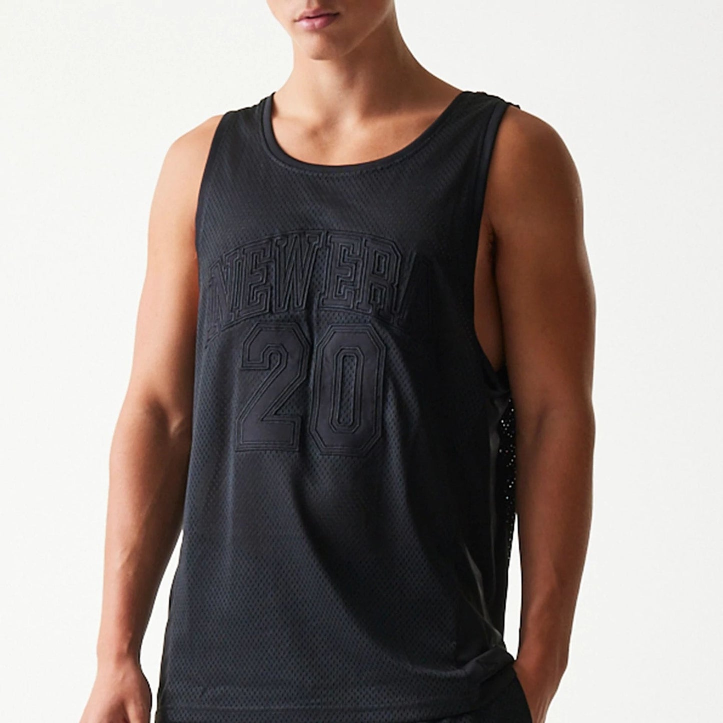 The Male model is wearing New Era Mesh Black Mesh Vest 5