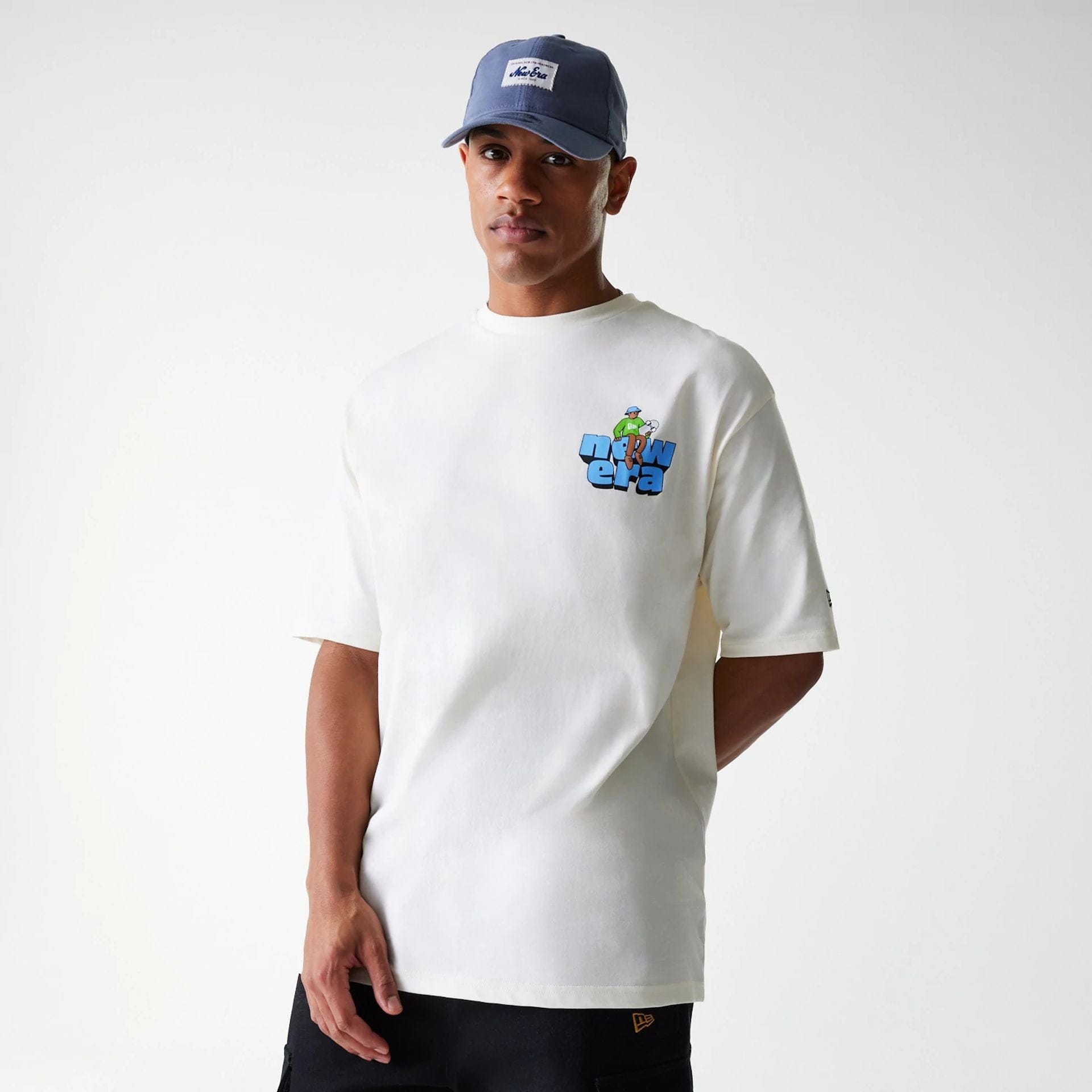 The Male model is wearing New Era Skate Graphic Open White Oversized T-Shirt 3