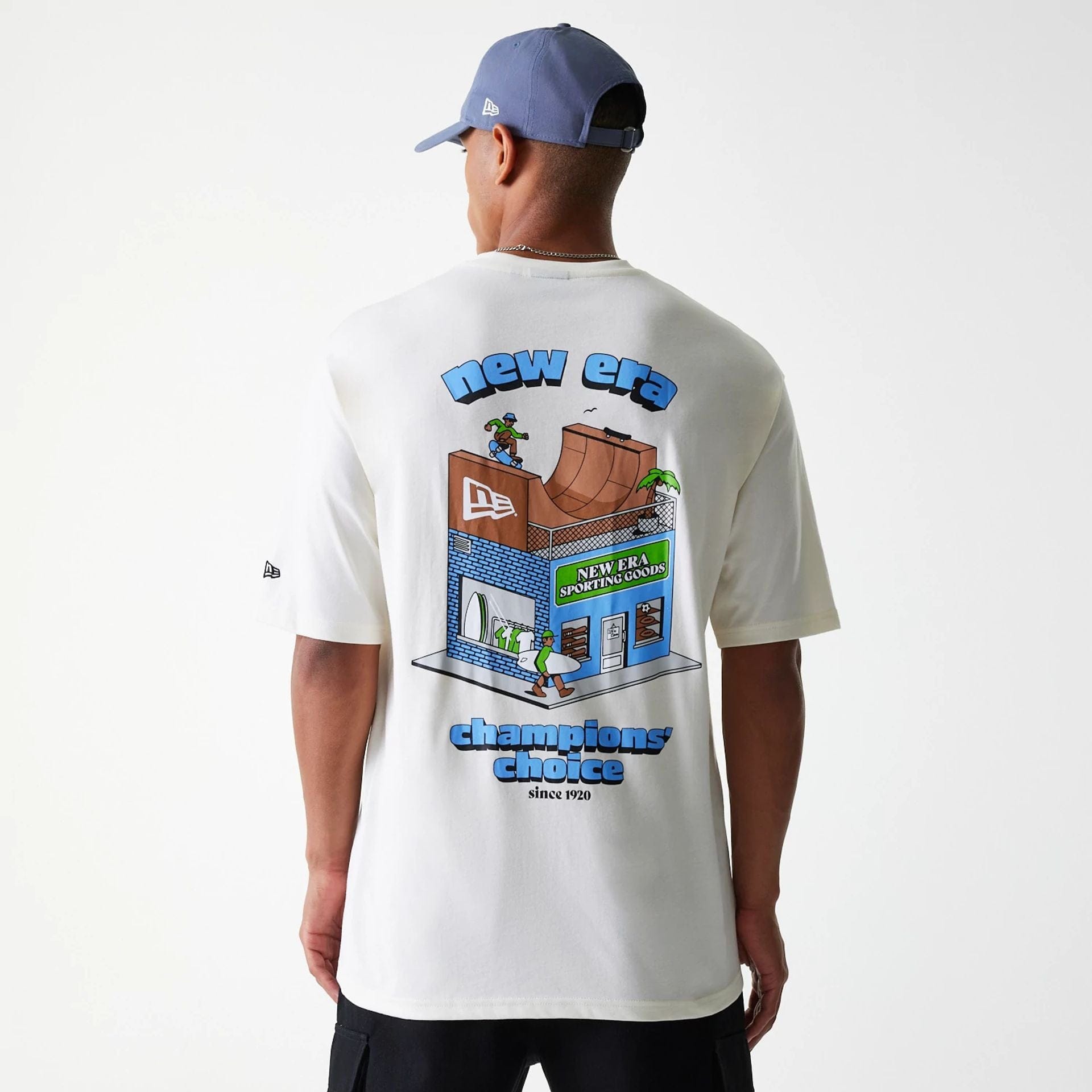 The Male model is wearing New Era Skate Graphic Open White Oversized T-Shirt 4