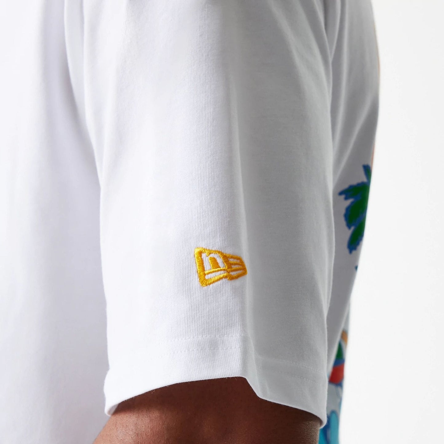 The Male model is wearing New Era Graphic White Oversized T-Shirt 7