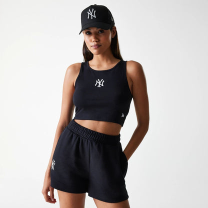 The Female model is wearing New York Yankees Womens MLB Midi League Essential Black Crop Tank Top 1