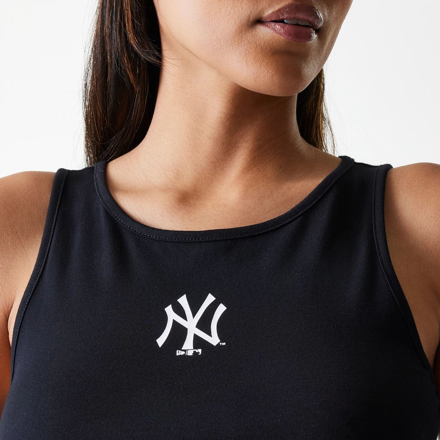 The Female model is wearing New York Yankees Womens MLB Midi League Essential Black Crop Tank Top 4