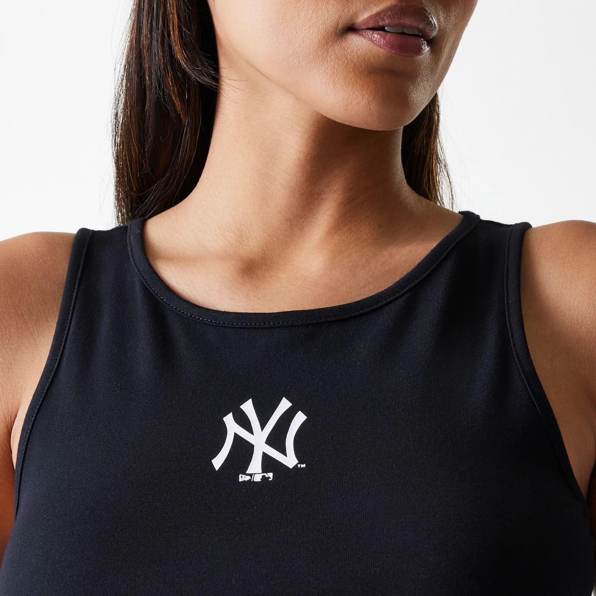 The Female model is wearing New York Yankees Womens MLB Midi League Essential Black Crop Tank Top 4