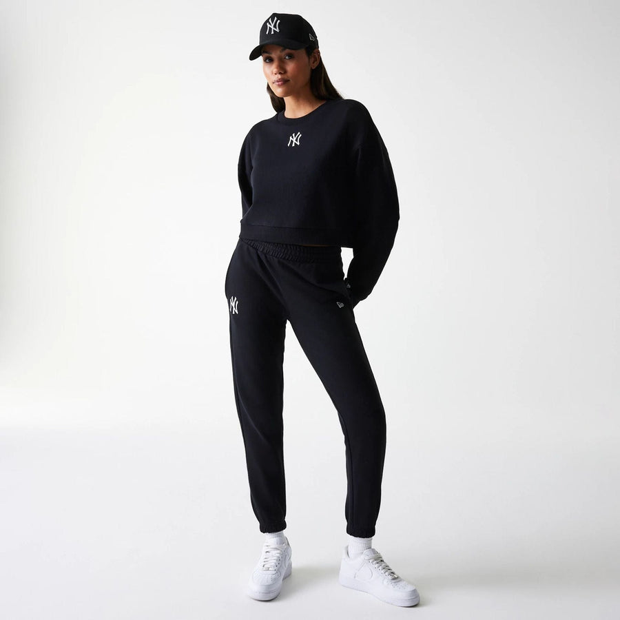 The Female model is wearing New York Yankees Womens MLB Midi League Essential Black Cropped Crew Neck Sweater 8