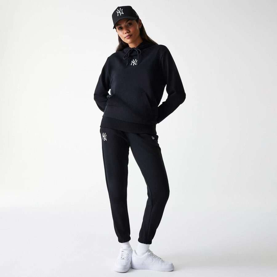 The Female model is wearing New York Yankees Womens MLB Midi League Essential Black Pullover Hoodie 8