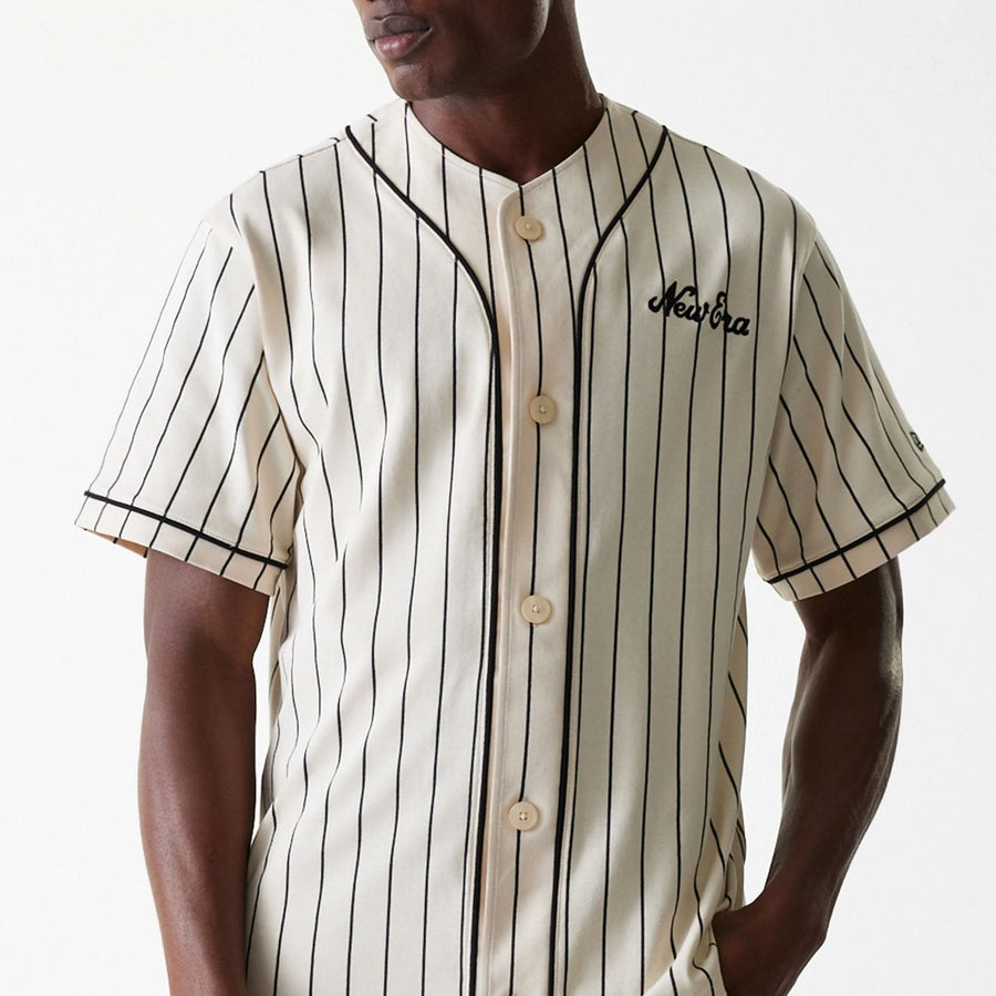 The Male model is wearing New Era Pinstripe Light Beige Jersey 3