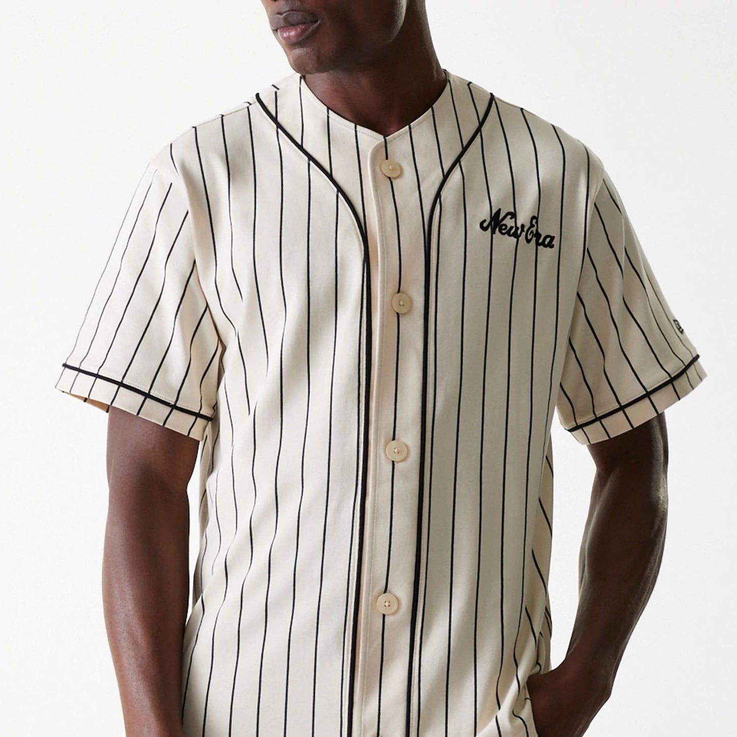 The Male model is wearing New Era Pinstripe Light Beige Jersey 3