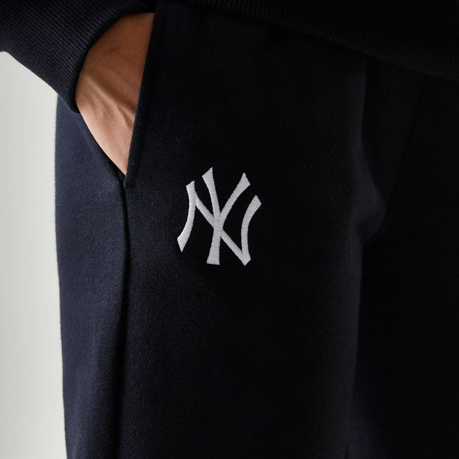The Female model is wearing New York Yankees Womens MLB Midi League Essential Black Joggers 3