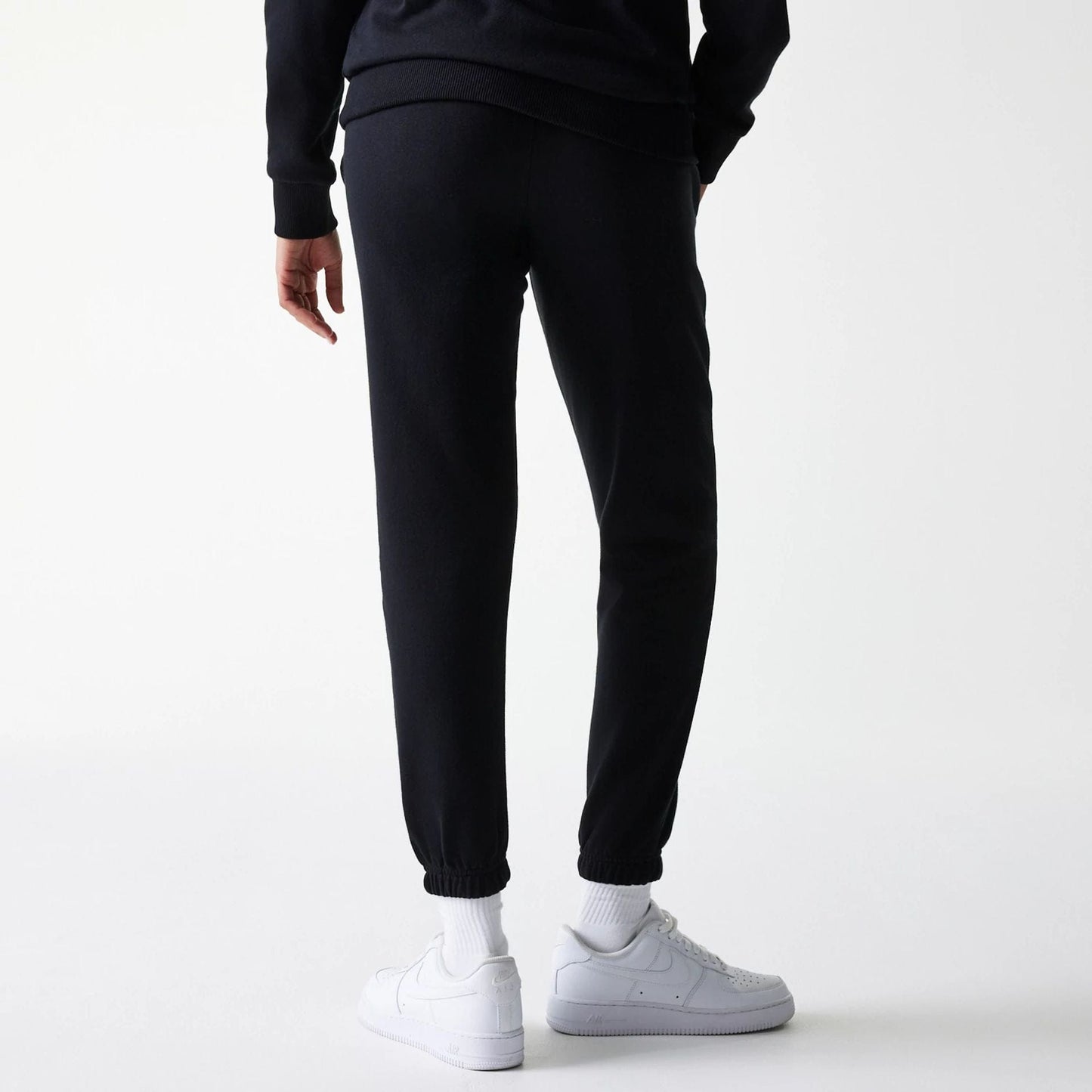 The Female model is wearing New York Yankees Womens MLB Midi League Essential Black Joggers 7