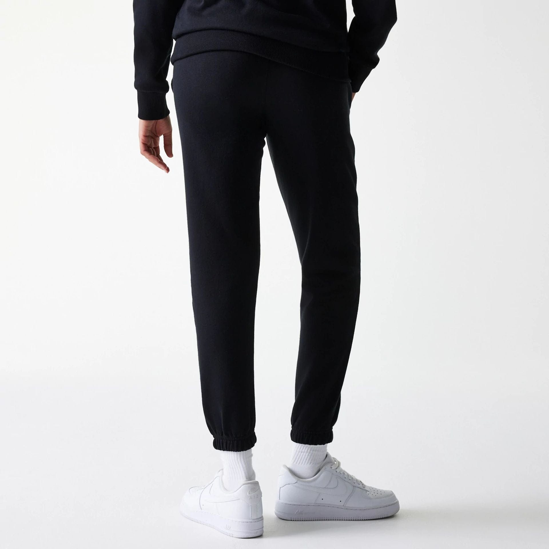 The Female model is wearing New York Yankees Womens MLB Midi League Essential Black Joggers 7