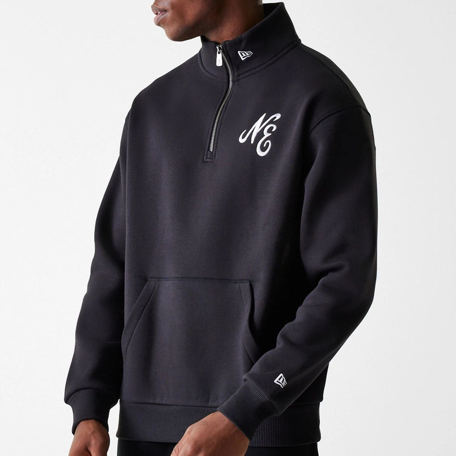 The Male model is wearing New Era Lifestyle Black 1/4 Zip Sweater 5