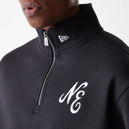 The Male model is wearing New Era Lifestyle Black 1/4 Zip Sweater 6