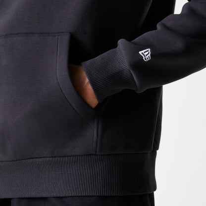 The Male model is wearing New Era Lifestyle Black 1/4 Zip Sweater 7