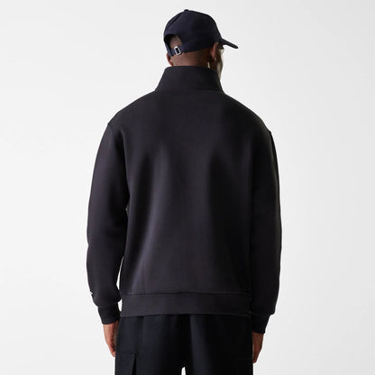 The Male model is wearing New Era Lifestyle Black 1/4 Zip Sweater 2